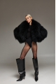 Women's short black fur coat made of natural llama fur